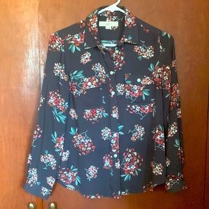 Long sleeve, grey floral blouse.